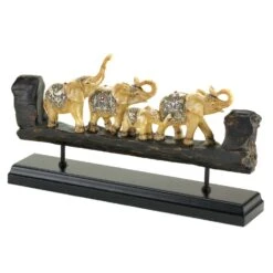 Accent Plus 7.75 In. H X 2.75 In. W X 13.5 In. L Ivory/Brown Poly Resin Carved Band Of Elephants